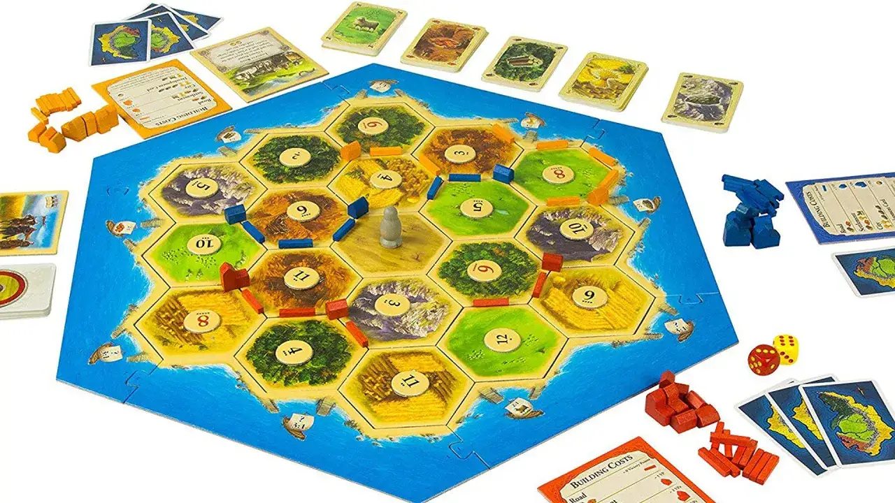 Plansza Catan gra planszowa zasady: osady, drogi, karty surowców i kości.
